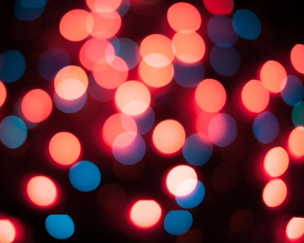 Luces de Navidad desenfocadas. Bokeh Año Nuevo. Fondo abstracto — Foto de Stock