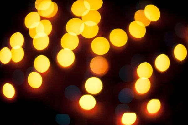 Luces de Navidad desenfocadas. Bokeh Año Nuevo. Fondo abstracto — Foto de Stock