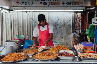 Erişte Kimberly Street Market, Penang adam satıyor