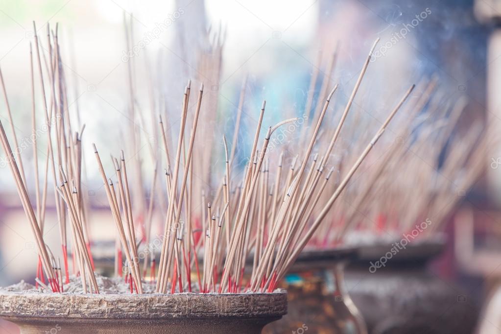 Burning incense in Chinese temple