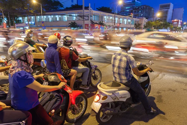Motorbike drivers at the crossroad, Ho Chi Minh City, Vietnam