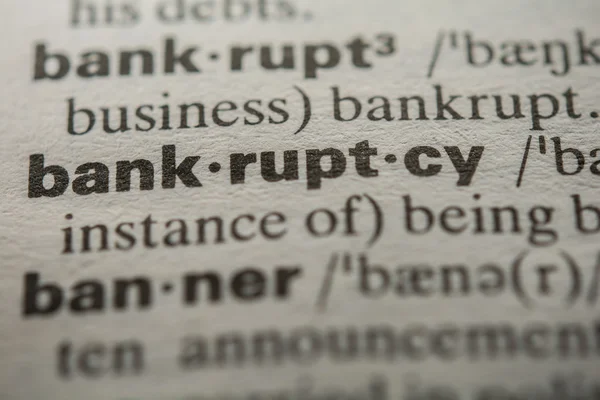 Определение слова "банкротство" — стоковое фото