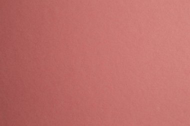 Kalın kağıt desenli bej arkaplan. eşit olmayan ışıklandırma