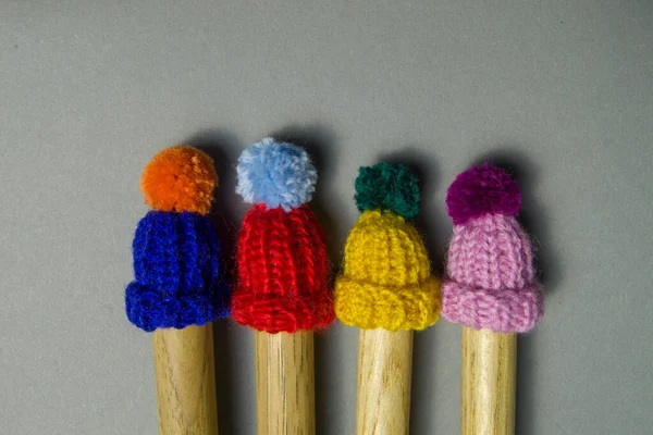 Little Knitted Hats Sit Drum Sticks Multicolored Hats Buboes — Stock Photo, Image