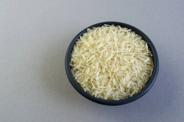 Basmati Rice Black Plate Gray Background — Stock Photo, Image