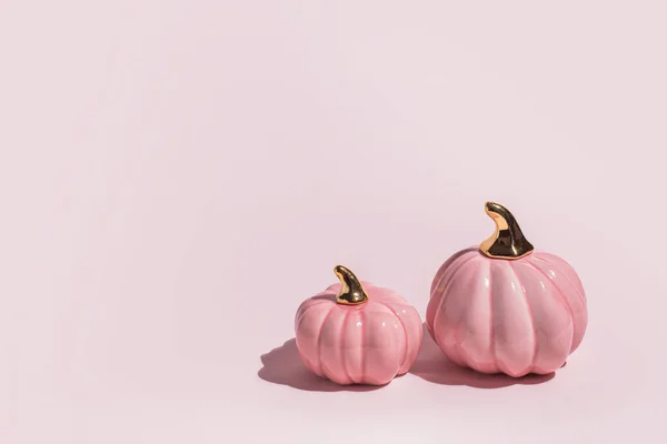 Two Decorative Ceramic Pumpkins Pink Background Hard Light Copy Space — Stock Photo, Image