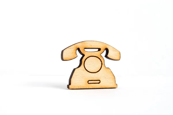 Wooden icon of telephone on white background — Stock Photo, Image