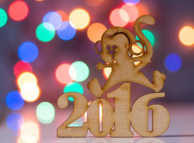 Maymun ve incsription in 2016 yıl garland ile ahşap işareti 