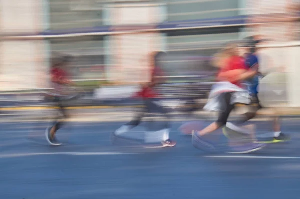 Runners at high speed on the streets