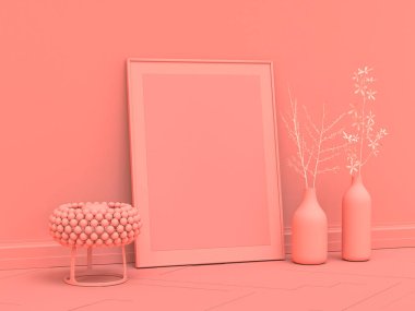 Zeminde dikey poster çerçevesi var. Tek renkli pembe bir odada. Zemin lambası var.