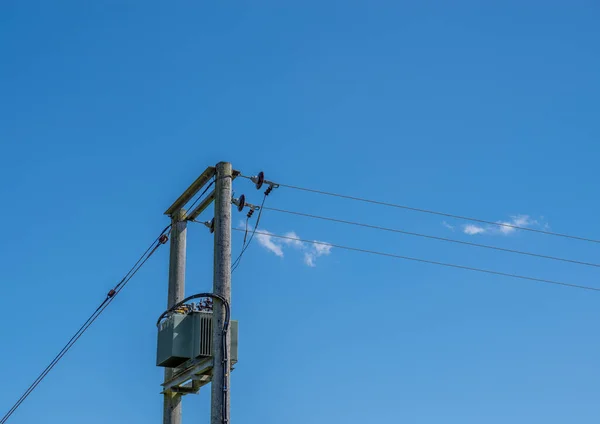 Electricity Transformer Two Wooden Telegraph Poles Blue Sky Background — Stock Photo, Image