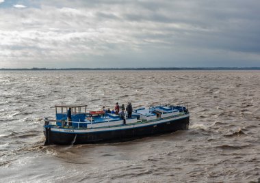 Hull, humberside, England, UK, 10/13/2017 - A Barge with passengers on a trip on the river Humber. clipart