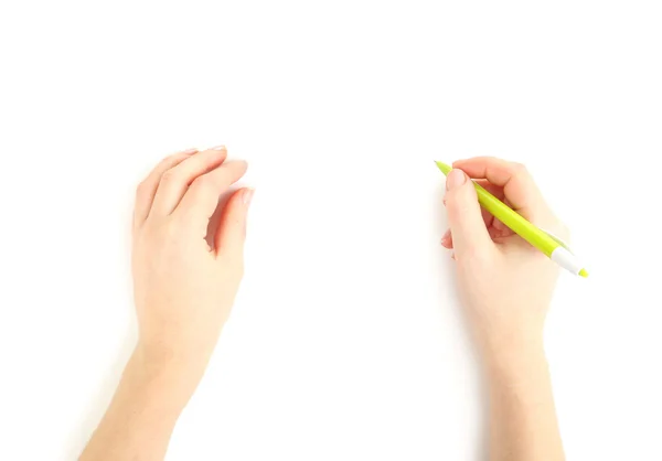 Женские руки с ручкой — стоковое фото