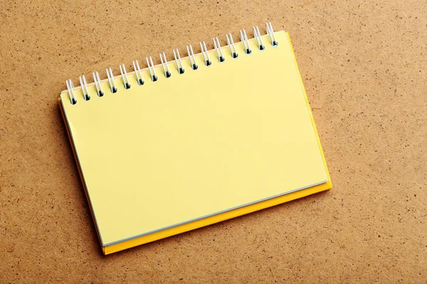 Open yellow notebook — Stock Photo, Image