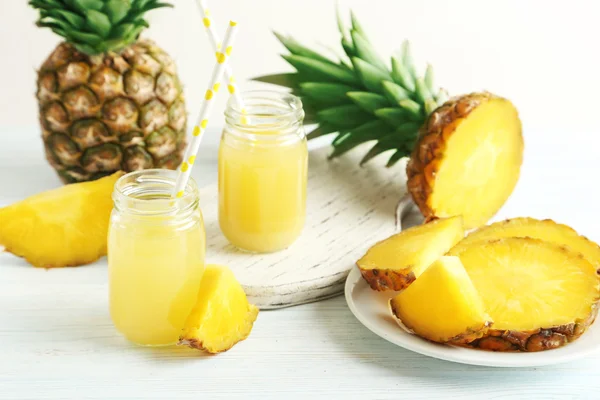 Bottles of pineapple juice — Stock Photo, Image