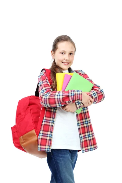 Menina com mochila e livros — Fotografia de Stock