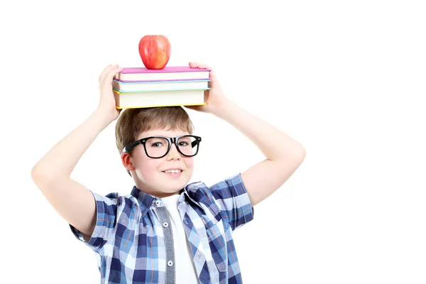 Junge mit Büchern und Brille — Stockfoto