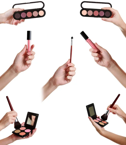 Vrouwelijke handen met borstels voor make-up — Stockfoto