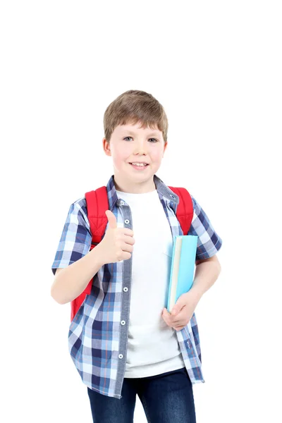 Junge mit Buch und Rucksack — Stockfoto