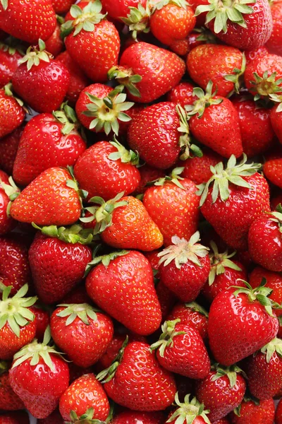 Frische und schmackhafte Erdbeeren Hintergrund — Stockfoto