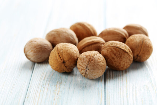 Walnuts on wooden table