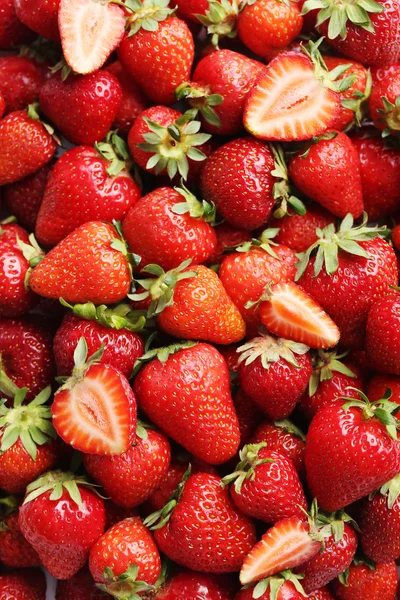 Frische und schmackhafte Erdbeeren Hintergrund — Stockfoto