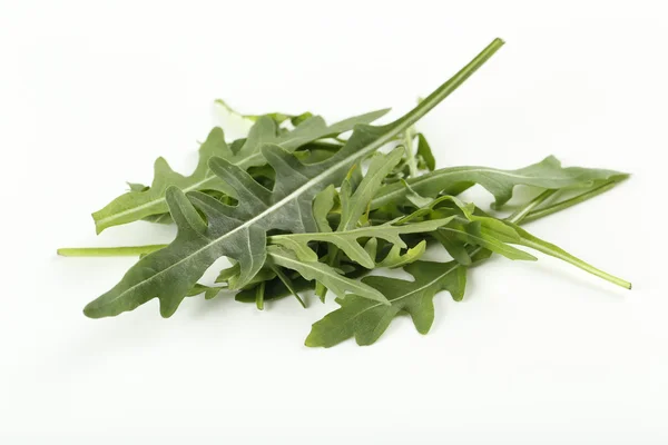 Fresh arugula leaves isolated — Stock Photo, Image