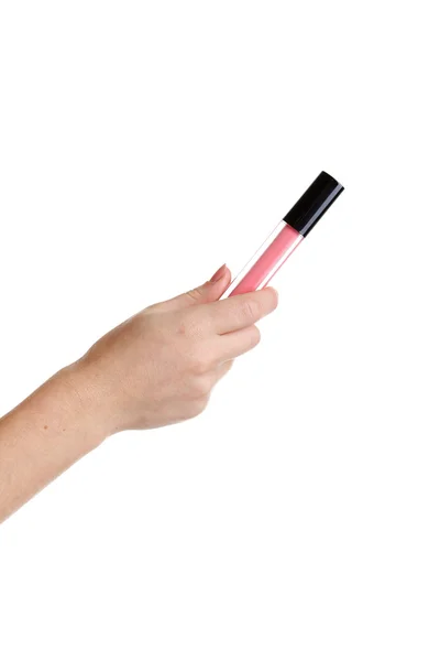 Weibliche Hand mit Lipgloss isoliert — Stockfoto