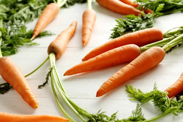 Fresh and sweet carrots on table — Stock Photo, Image