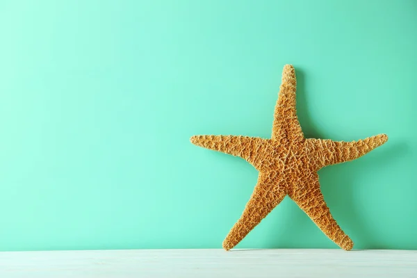 Starfish na mesa de madeira — Fotografia de Stock