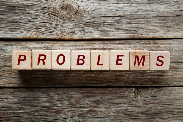 Word problems on wooden toy cubes — Stock Photo, Image