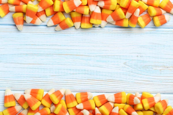 Halloween candy corns on blue — Stock Photo, Image