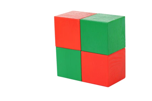 Cubos de brinquedo de madeira coloridos isolados — Fotografia de Stock