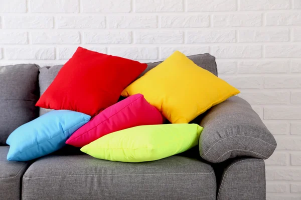 Colorful pillows on sofa — Stock Photo, Image