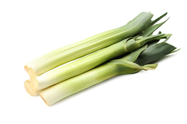 Green leeks on a white