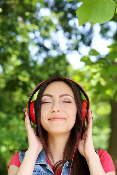 Young woman in headphones — Stock Photo, Image