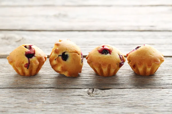 Tasty muffins with blueberries — Stock Photo, Image