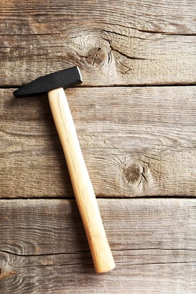 New hammer on table — Stock Photo, Image