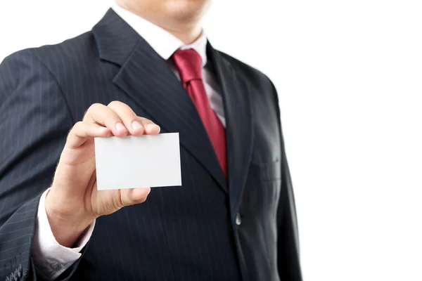 Businessman holding card — Stock Photo, Image