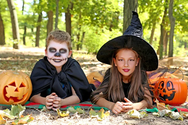 Kids in halloween costumes — Stock Photo, Image