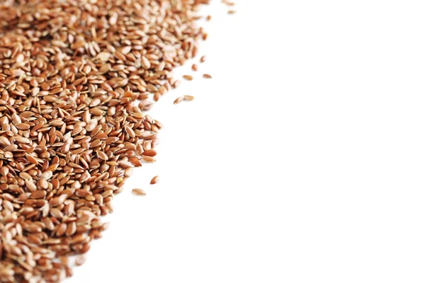 Flax seeds on a white — Stock Photo, Image