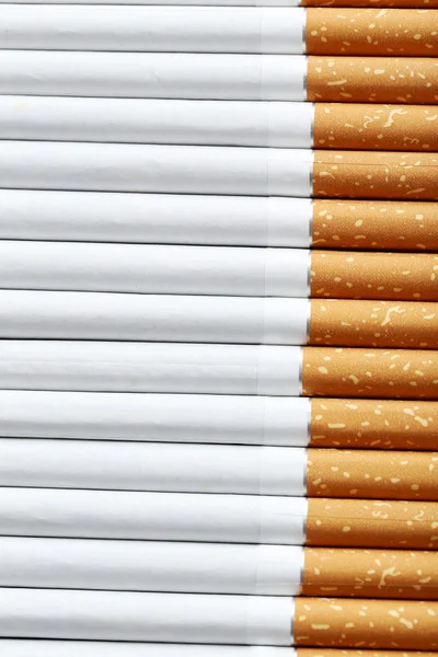 Tobacco cigarettes background — Stock Photo, Image