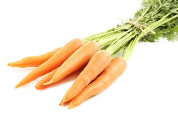 Fresh carrots on a white — Stock Photo, Image