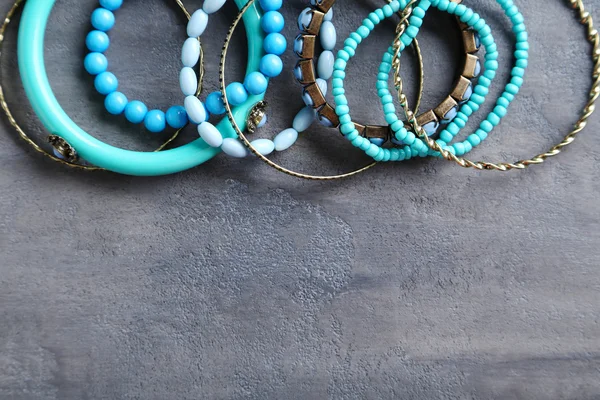 Beautiful bracelets on table — Stock Photo, Image