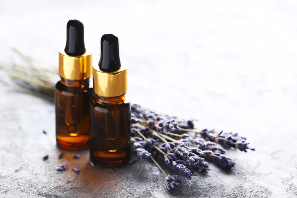 Lavender oil and flowers — Stock Photo, Image