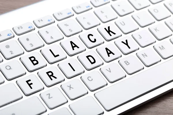 Background of new computer keyboard with text Black Friday