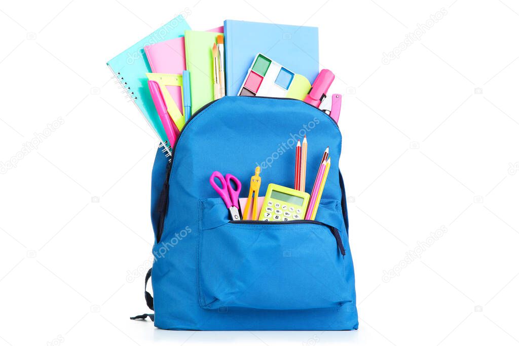 Backpack with school supplies isolated on white background