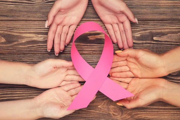 Breast Cancer Concept Group People Hands Holding Pink Paper Ribbon — Stock Photo, Image