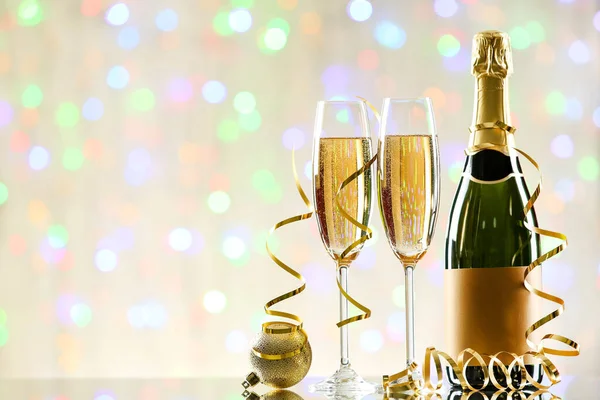 Bottle Glasses Champagne Bauble Ribbons Blurred Lights Background — Stock Photo, Image