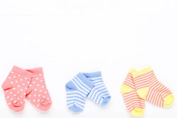 Baby Socks White Wooden Table — Stock Photo, Image